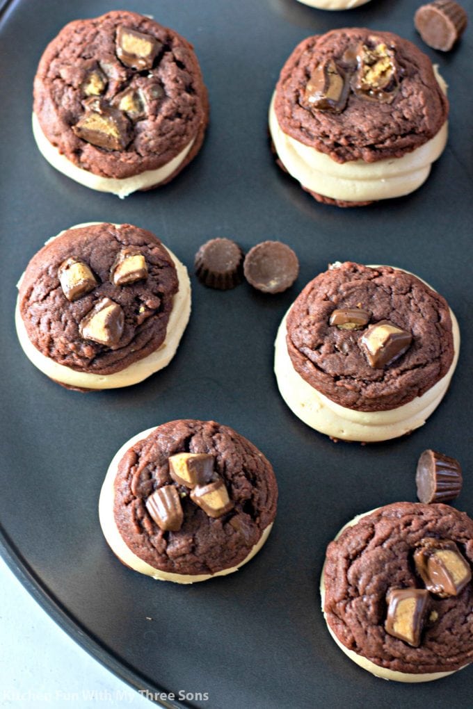 Chocolate Peanut Butter Cup Sandwich Cookies on a cookie sheet