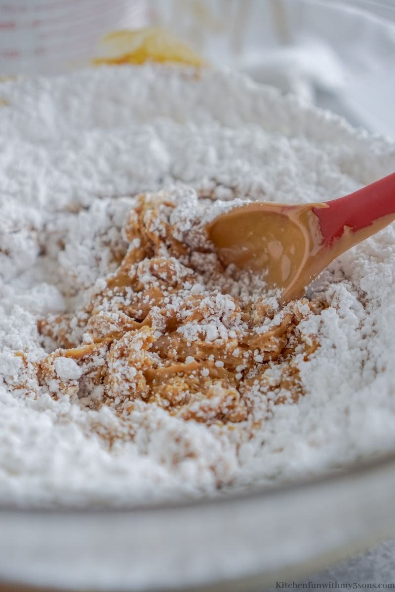 The powdered sugar added into the peanut butter mixture.