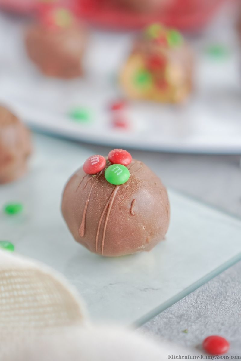 Close up of one of the Christmas Peanut Butter Balls.