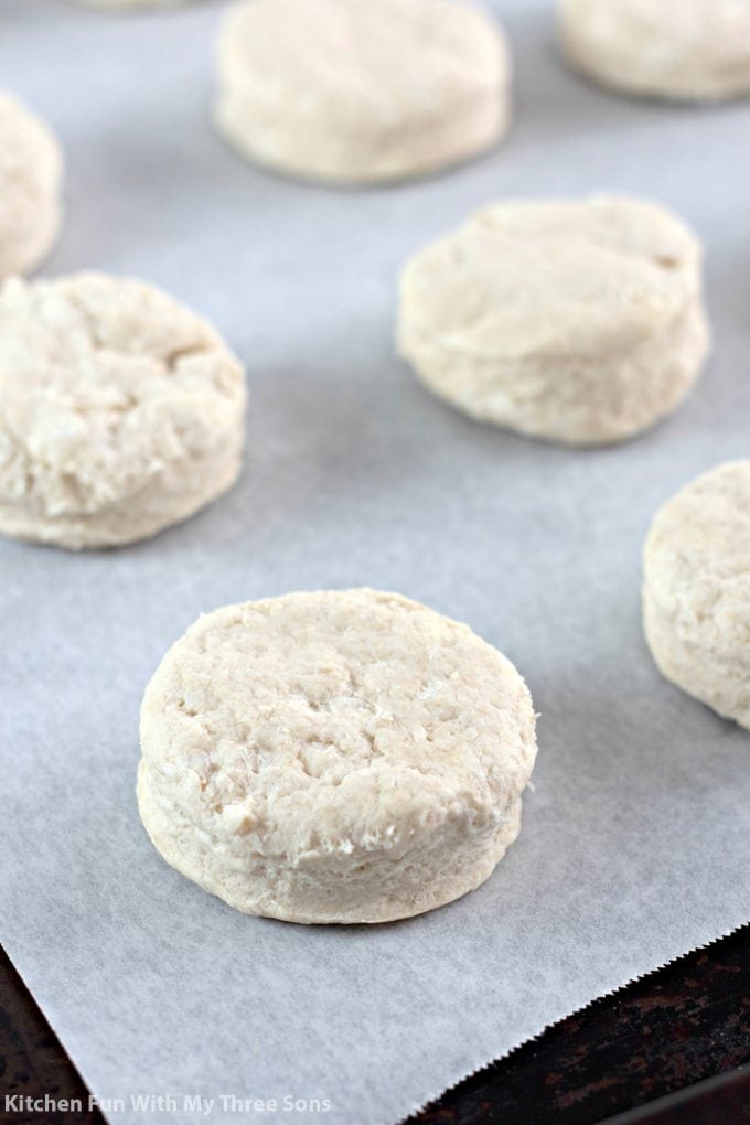 biscuit dough disks on a cookie sheet