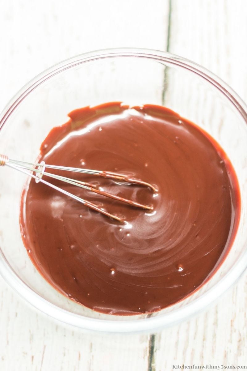 Adding your chocolate and cream together to make your chocolate swirl.