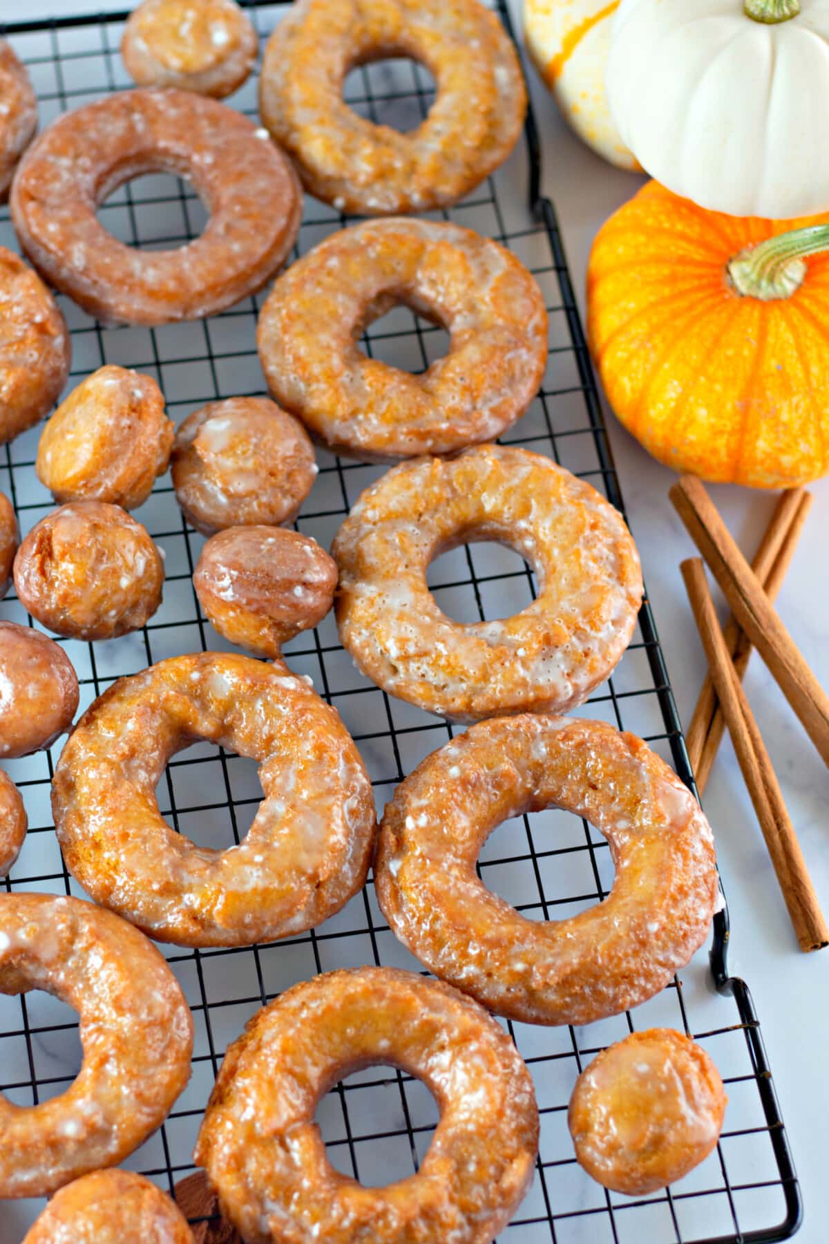 Tops of pumpkin donuts and donut holes