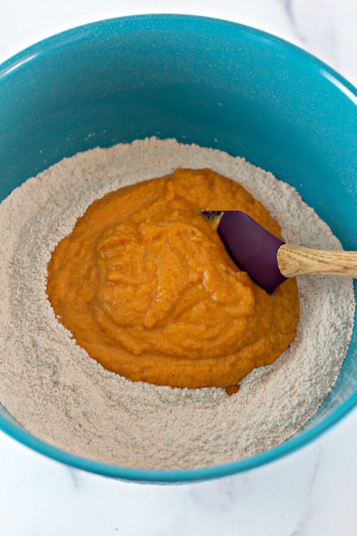 adding pumpkin mixture to dry ingredients