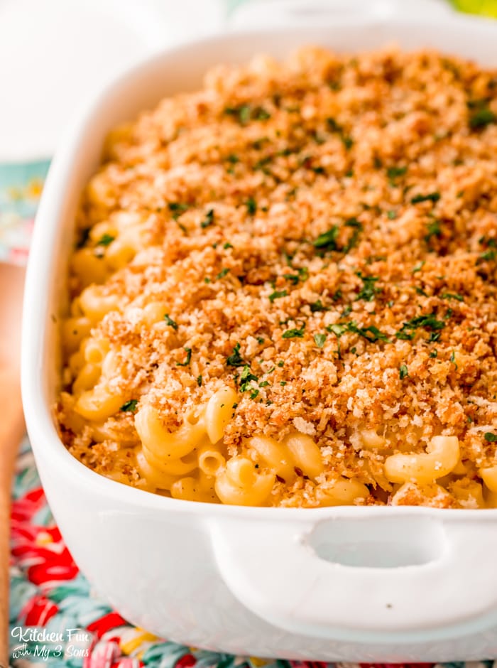 Angled view of baked macaroni and cheese in a casserole dish