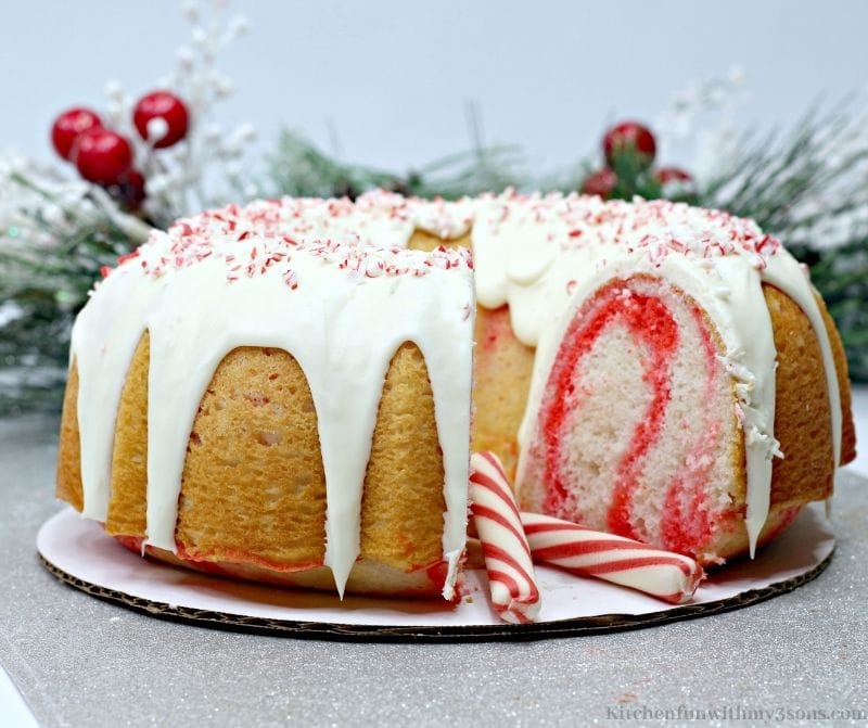 Candy Cane Bundt Cake with a slice taken out of it.