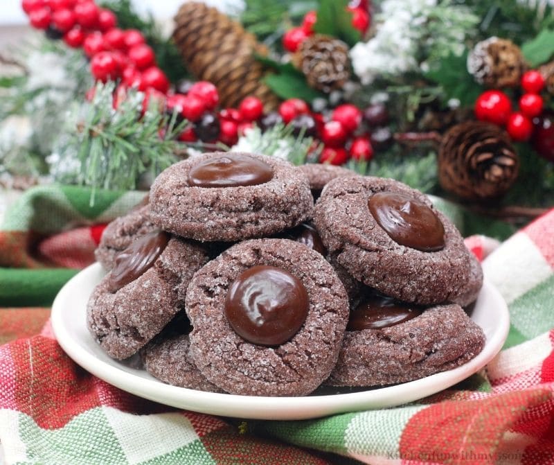 Chocolate Espresso Cookies on a serving plate with decorations behind it.