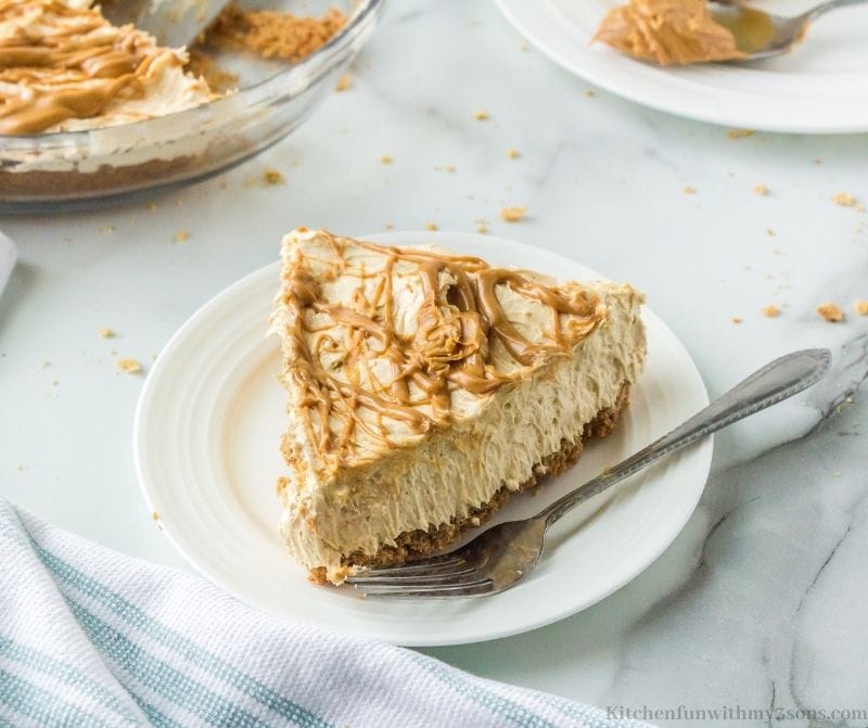 A slice of the Creamy Peanut Butter Pie Recipe on a serving plate.