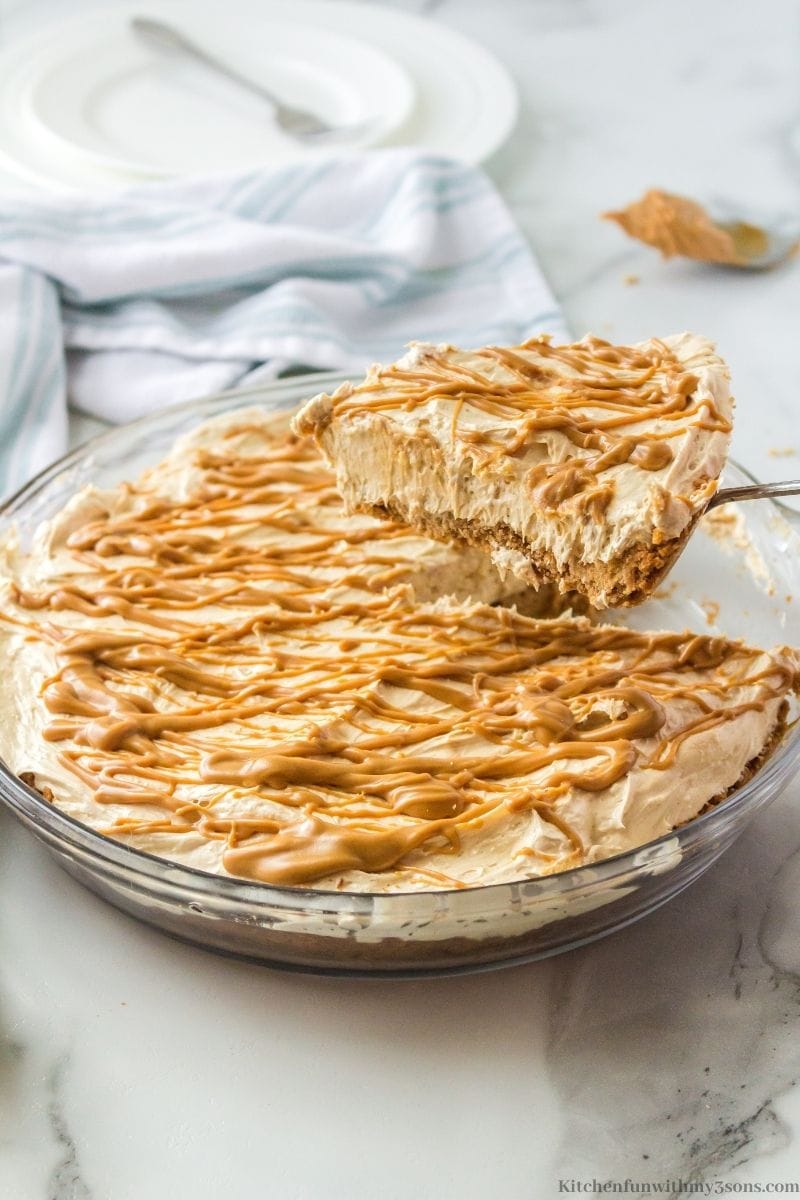 Creamy Peanut Butter Pie Recipe in the pie dish with a slice taken out.