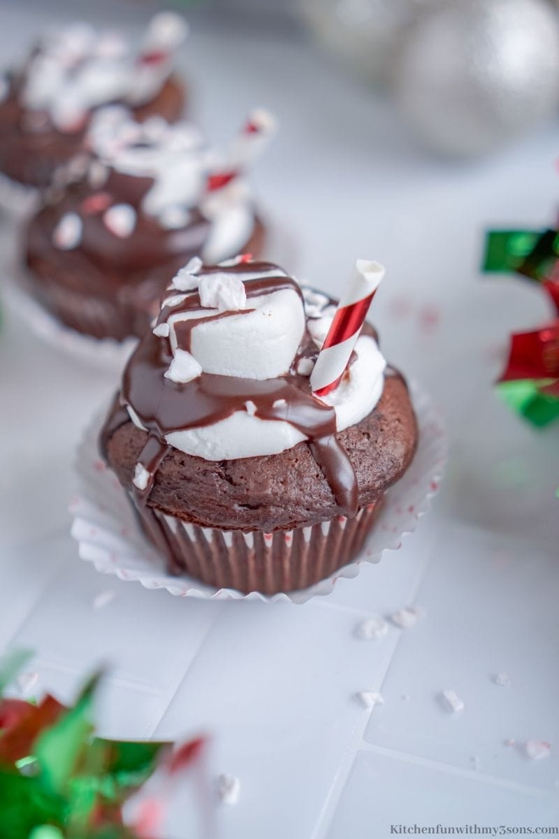Hot Chocolate Cupcakes garnished with peppermint crushed on top.