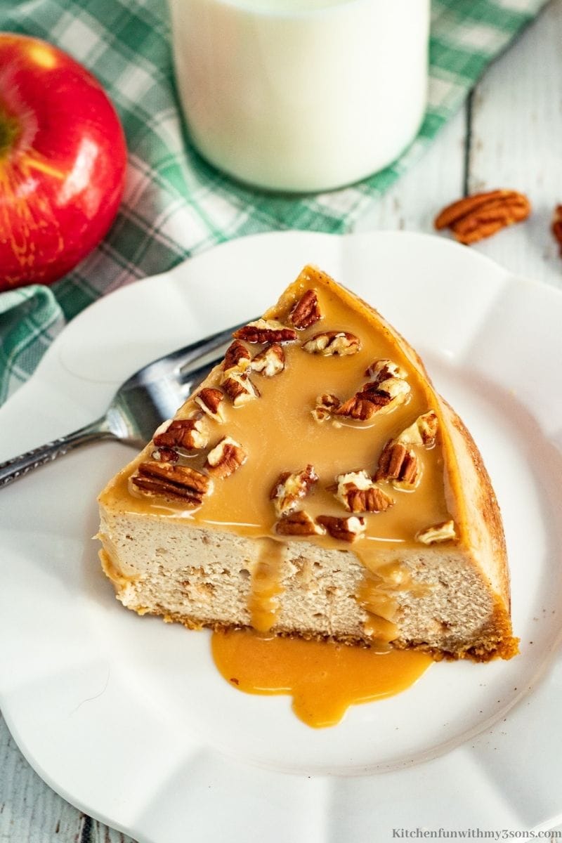 Slice of the Instant Pot Caramel Apple Cheesecake on a serving plate.