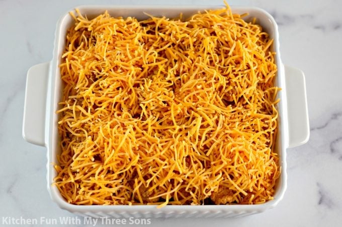 shredded cheese over top of the casserole