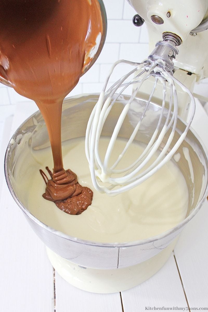 The melted chocolate being added into the batter.