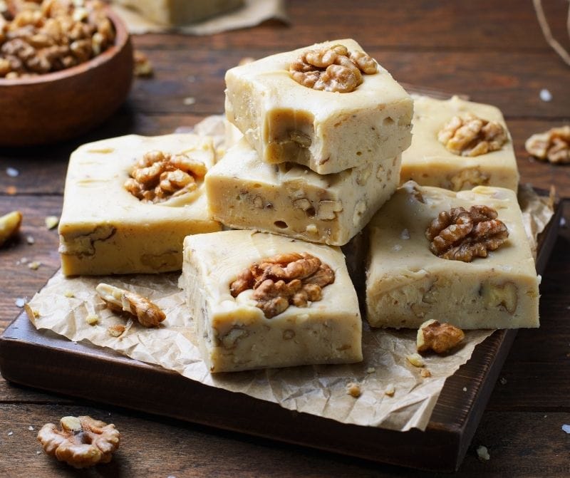 Maple Walnut Fudge stacked on top of each other.