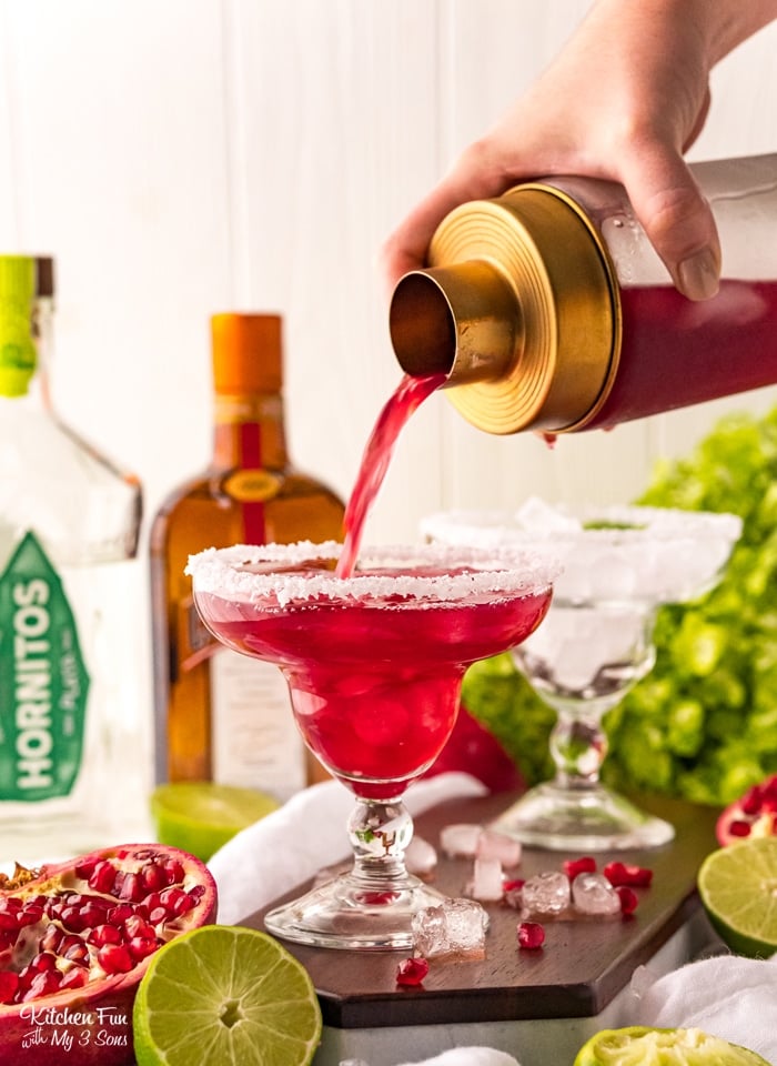 Pomegranate Margarita gives a twist on a traditional margarita with tequila, Cointreau, lime juice, simple syrup, and pomegranate juice. 