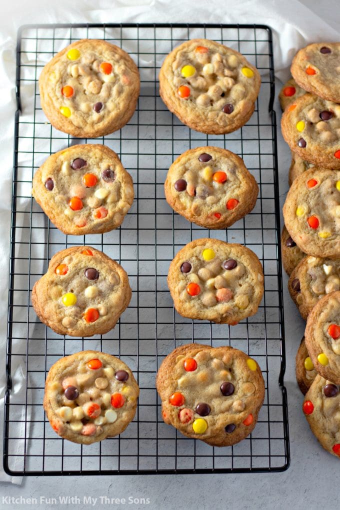Reese's Pieces Cookies on a wire cooking rack