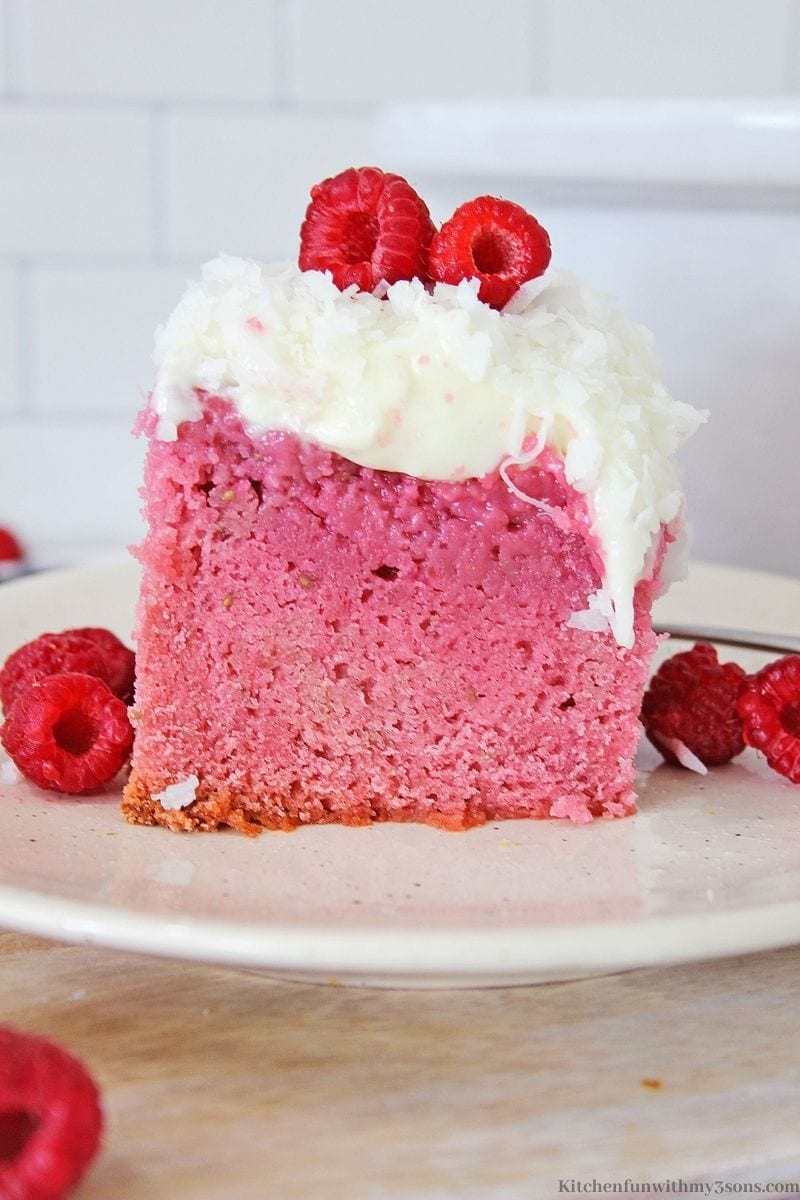 Slow Cooker Raspberry Zinger Cake on a serving plate.