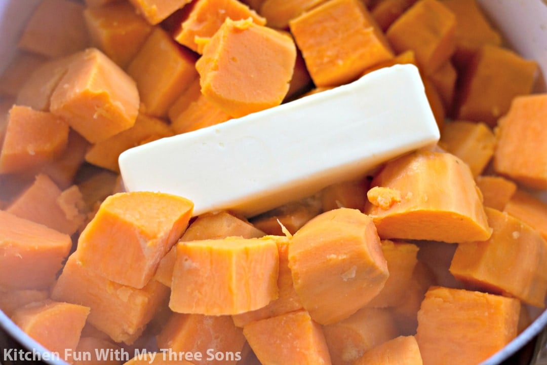 Chunks of cooked sweet potatoes in a pan