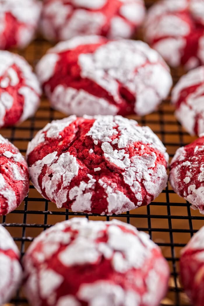 baked red velvet cookies on a cooling rack