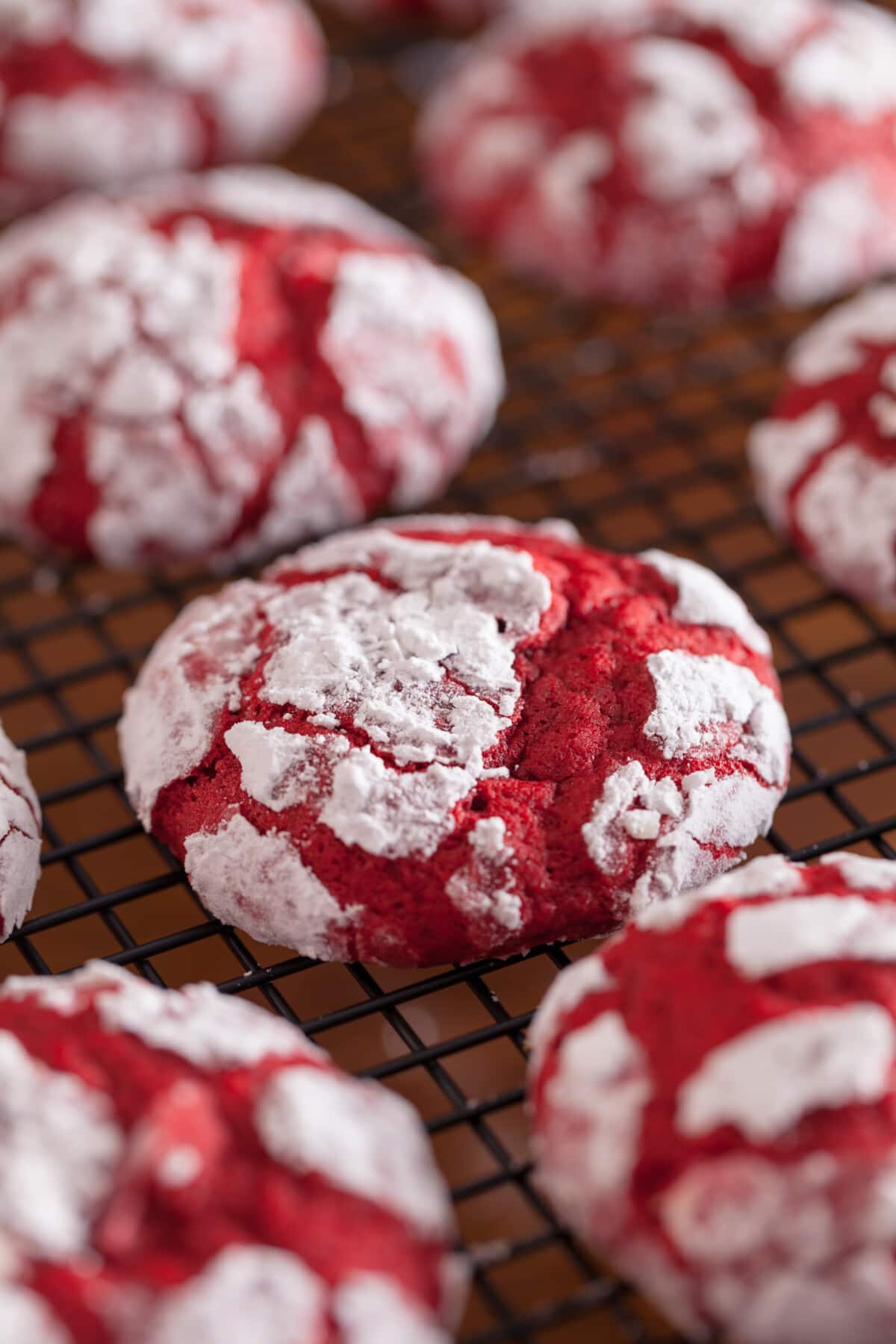Red Velvet Crinkle Cookies on a baking rack