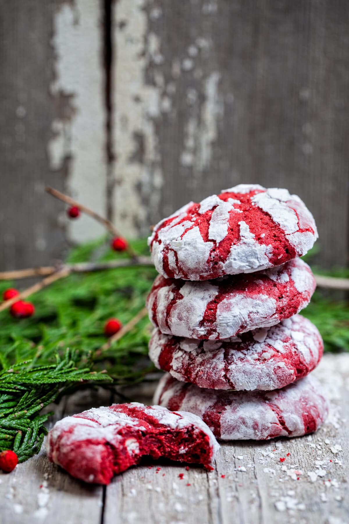 Red Velvet Crinkle Cookies with a bite taken out