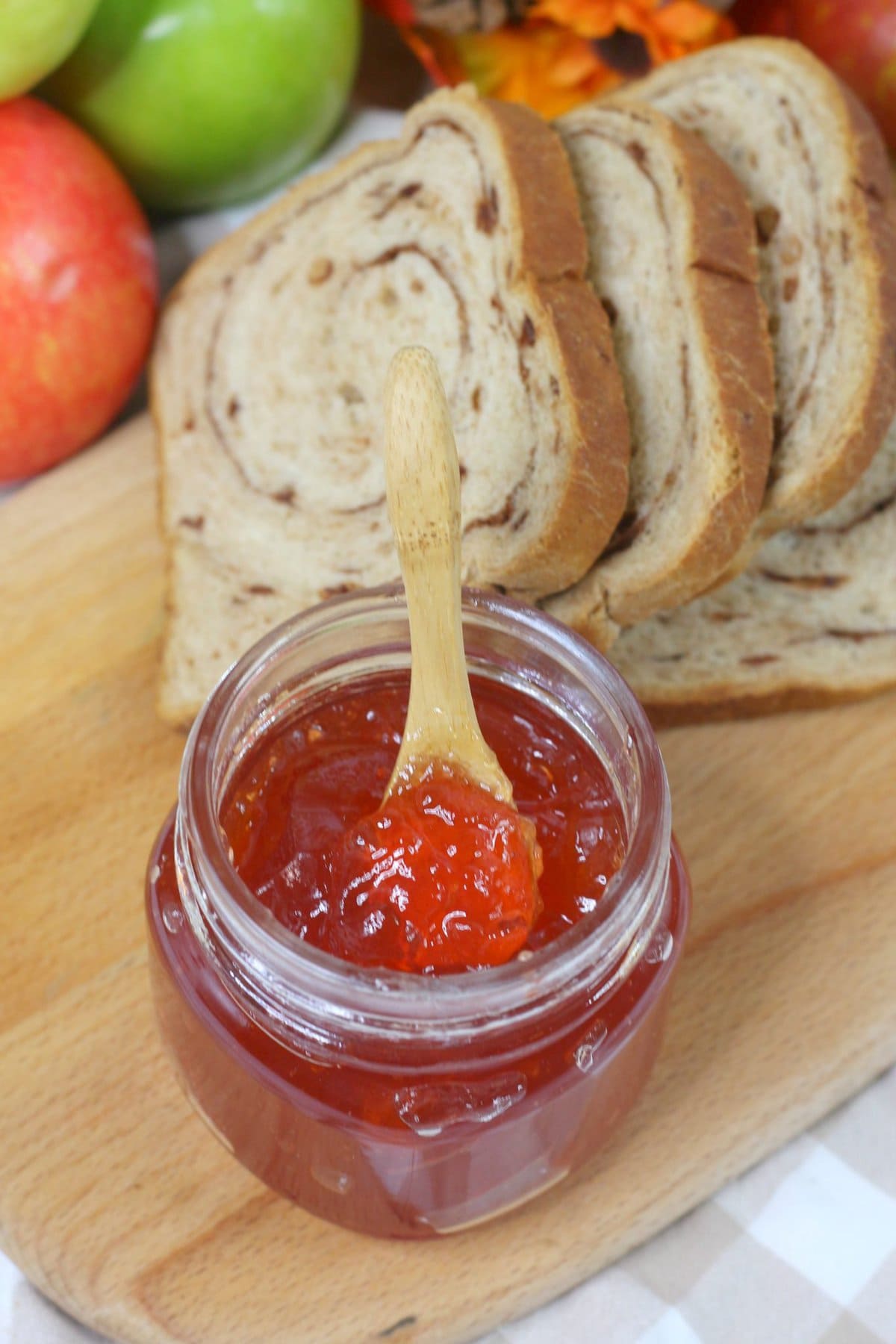 Instant Pot Apple Jelly in a jar with bread