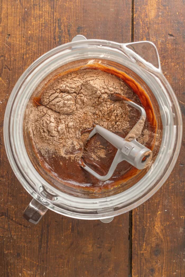 These Chocolate Peppermint Cookies are loaded with semi-sweet, white, and dark chocolate plus crushed peppermint. Soft & chewy! Combining wet and dry cookie dough ingredients in a bowl