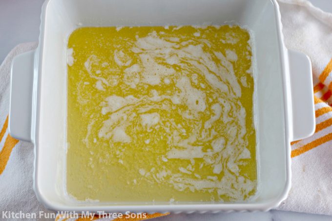 melted butter in the casserole dish