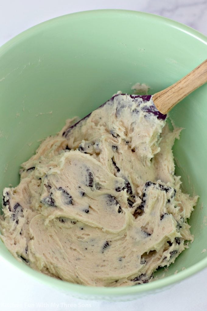 Oreo Cheesecake Cookies dough in a mint green bowl
