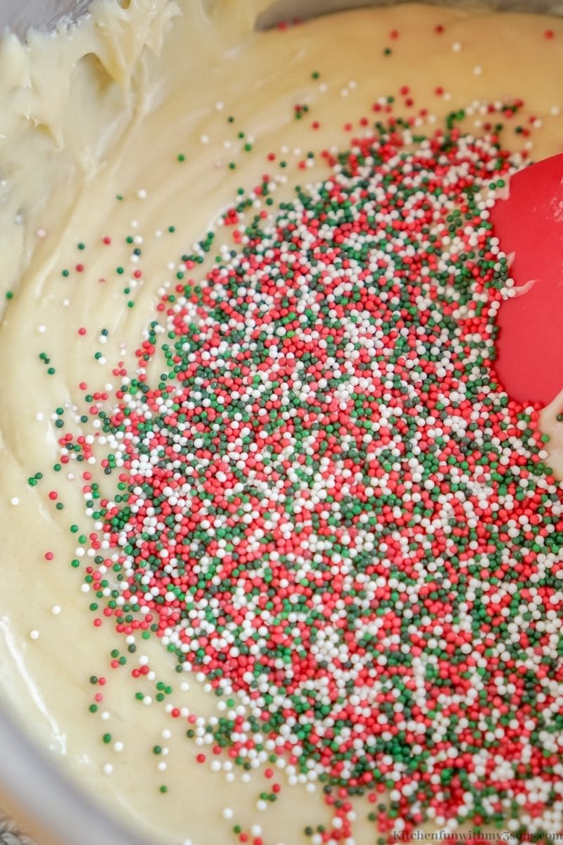 Adding the sprinkles into the batter.