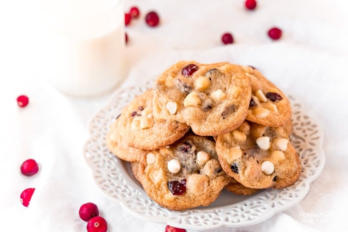 White Chocolate Cranberry Macadamia Nut Cookies are SO good! They are slightly crispy around the edge and the center is soft and chewy. Cranberries add a touch of tart while the white chocolate chips bring the sweet and the macadamia nuts add some crunch and a lovely flavor that brings everything together!