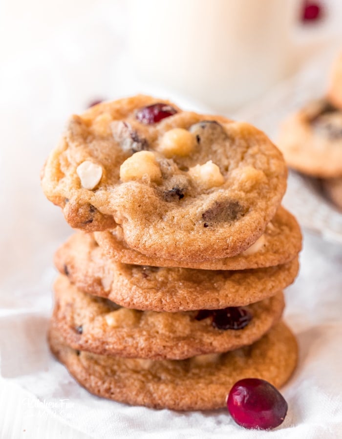 White Chocolate Cranberry Macadamia Nut Cookies are SO good! They are slightly crispy around the edge and the center is soft and chewy. Cranberries add a touch of tart while the white chocolate chips bring the sweet and the macadamia nuts add some crunch and a lovely flavor that brings everything together!