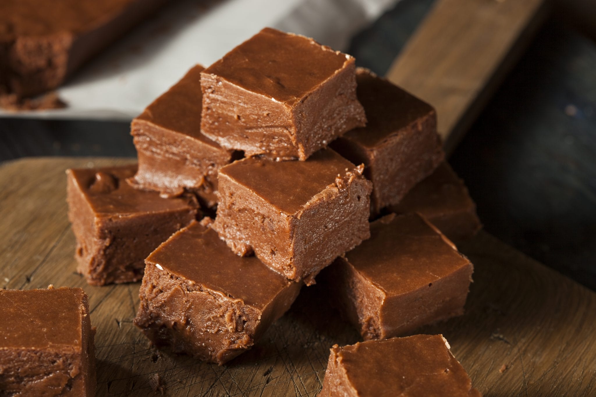 A pyramid-shaped stack of chocolate fudge squares.