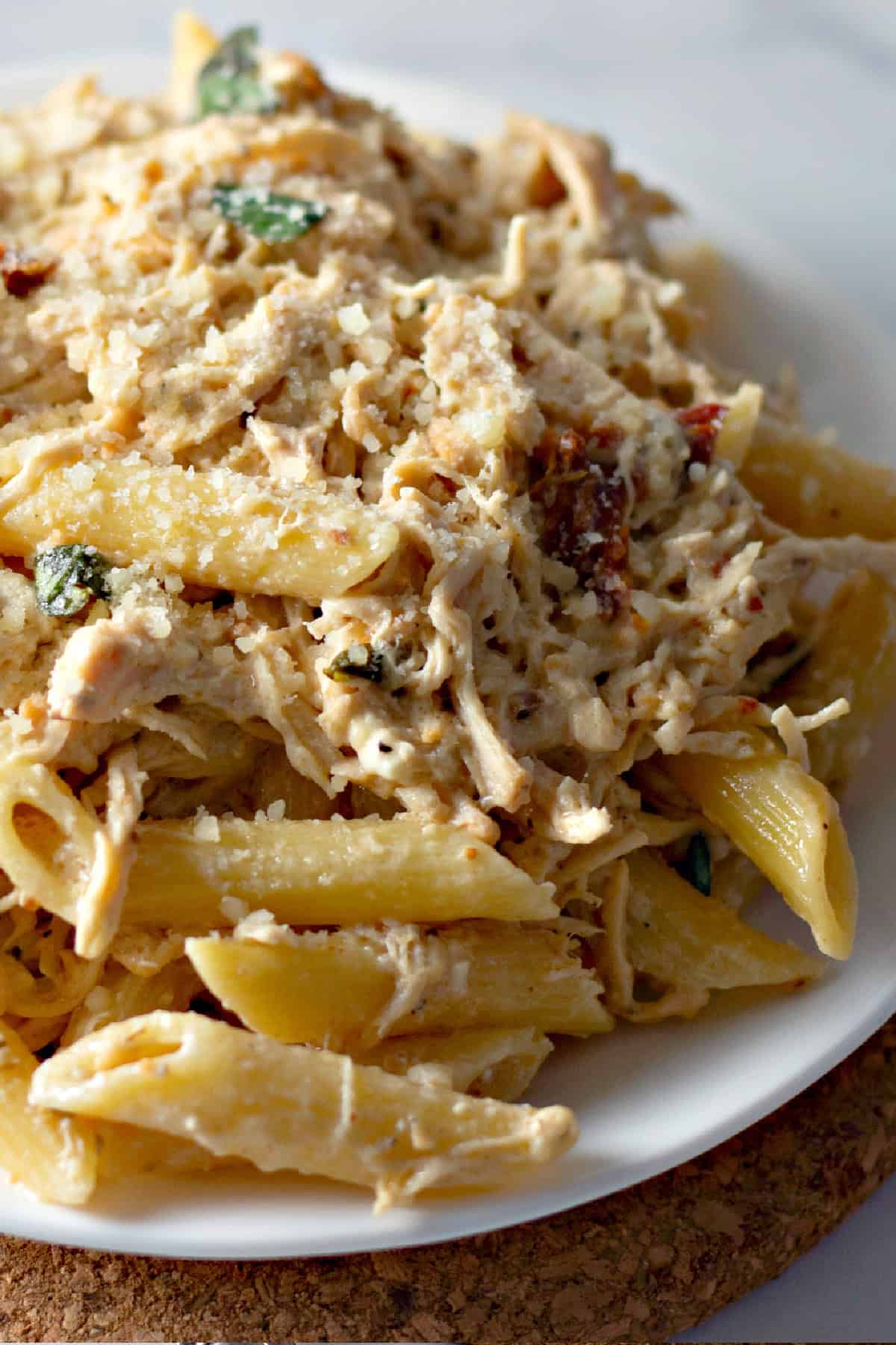 This Olive Garden Chicken Pasta is one of the easiest slow cooker dinners you'll ever make! Olive Garden Chicken Pasta on a plate