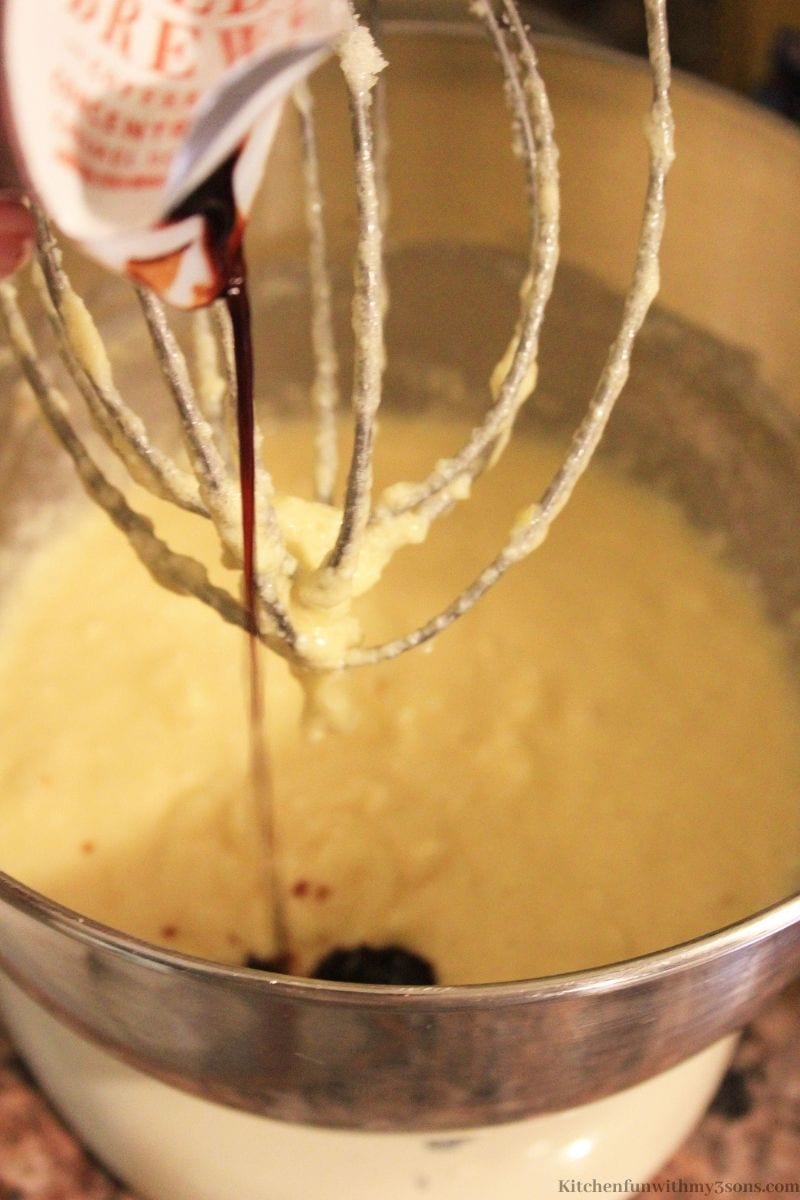 Adding the instant coffee into the batter.