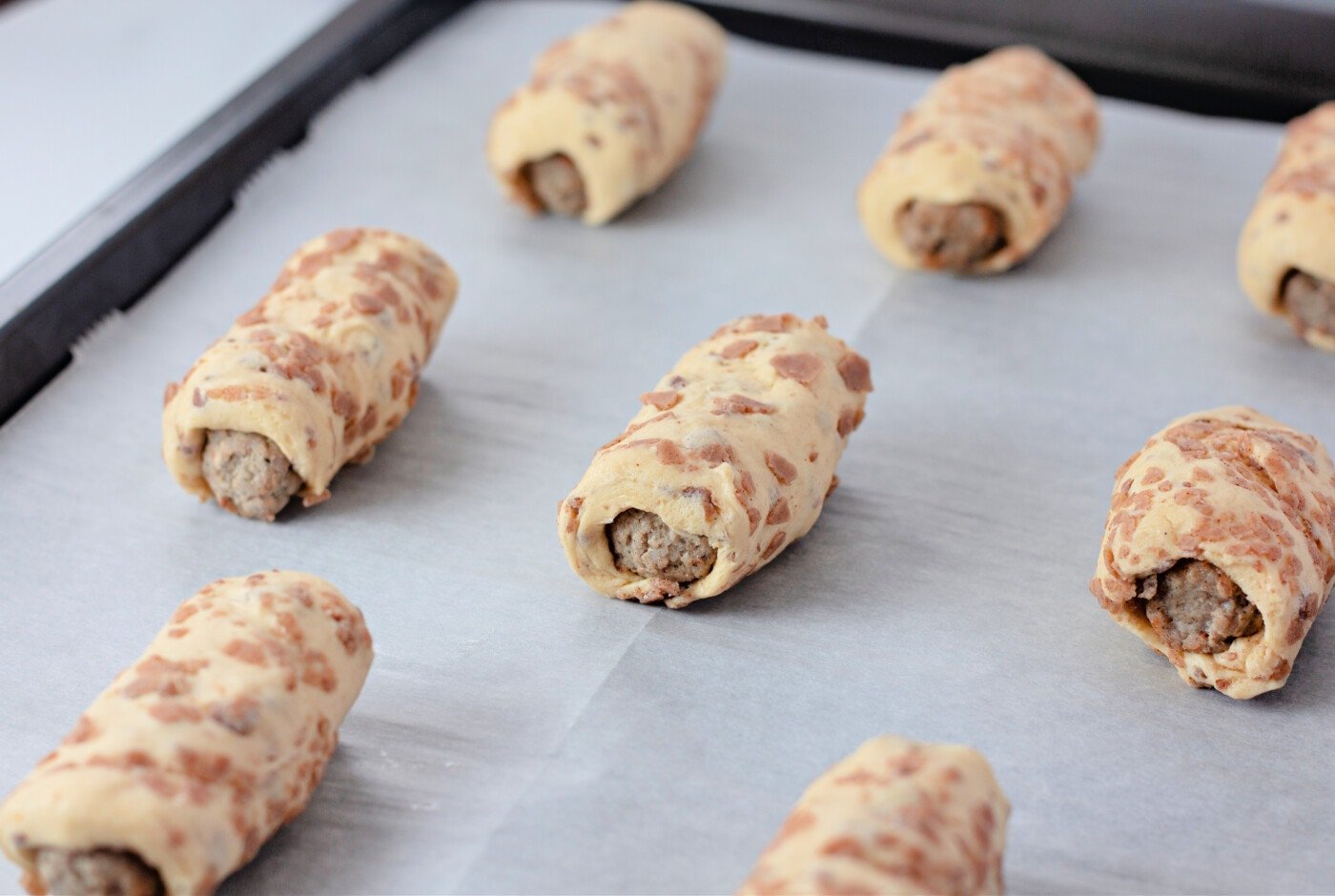 sausages wrapped in cinnamon rolls