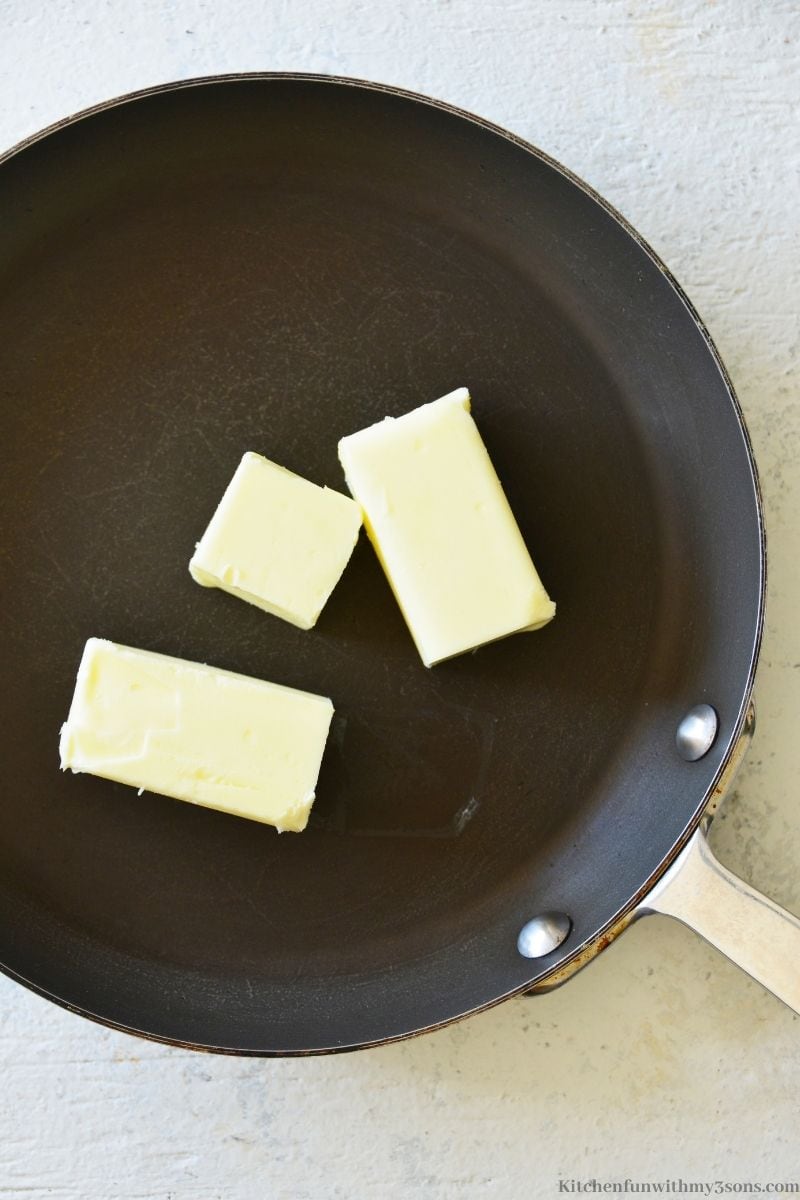 The butter in a skillet.
