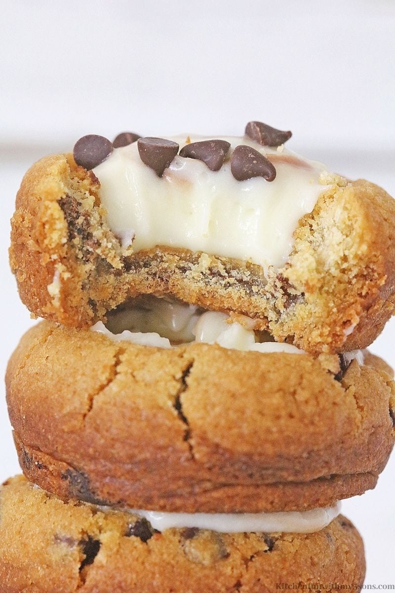 One of the Mini Chocolate Chip Cookie Cheesecakes with a bite taken out of it.