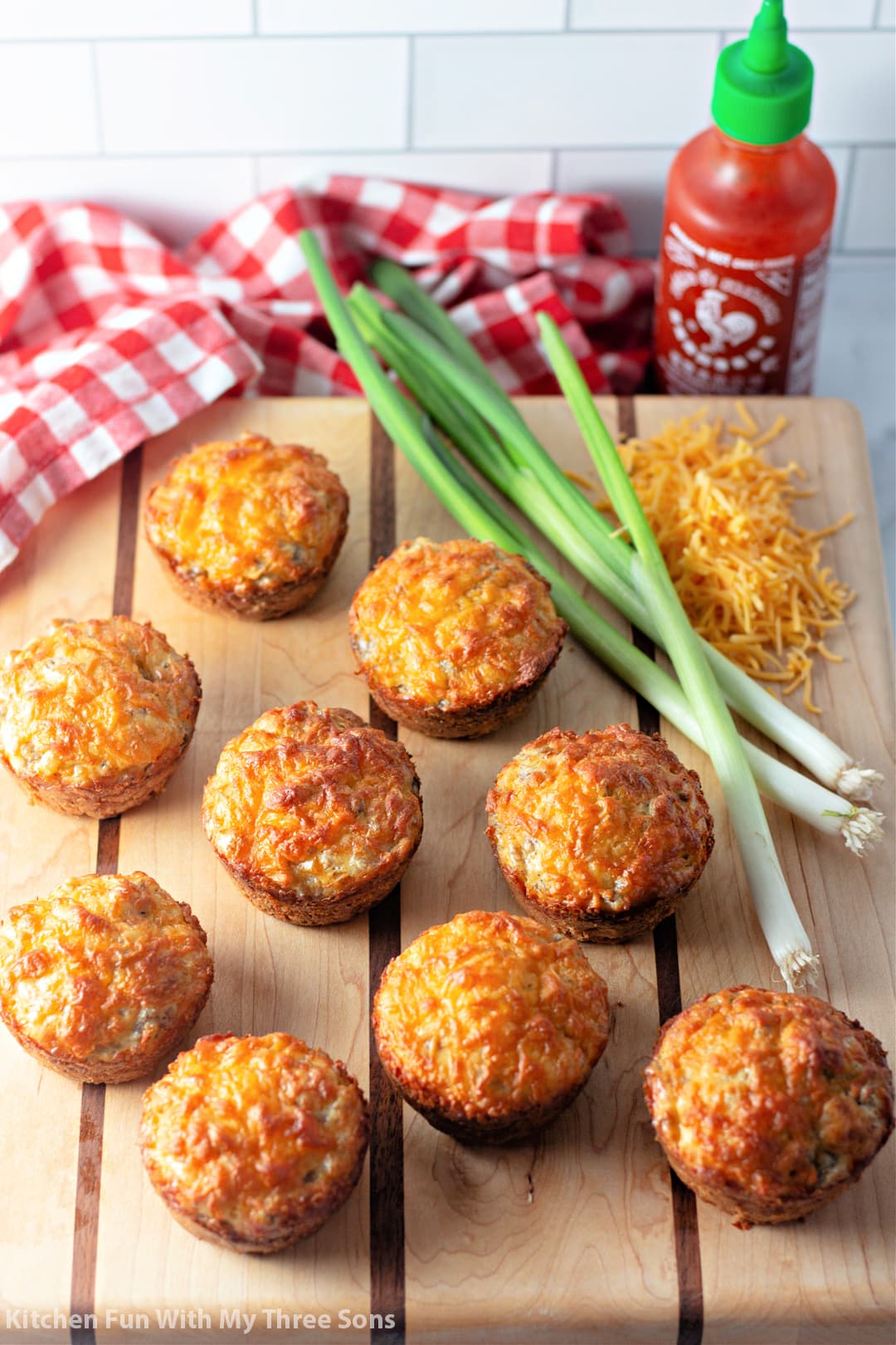 Sausage Breakfast Muffins on a wood cutting board