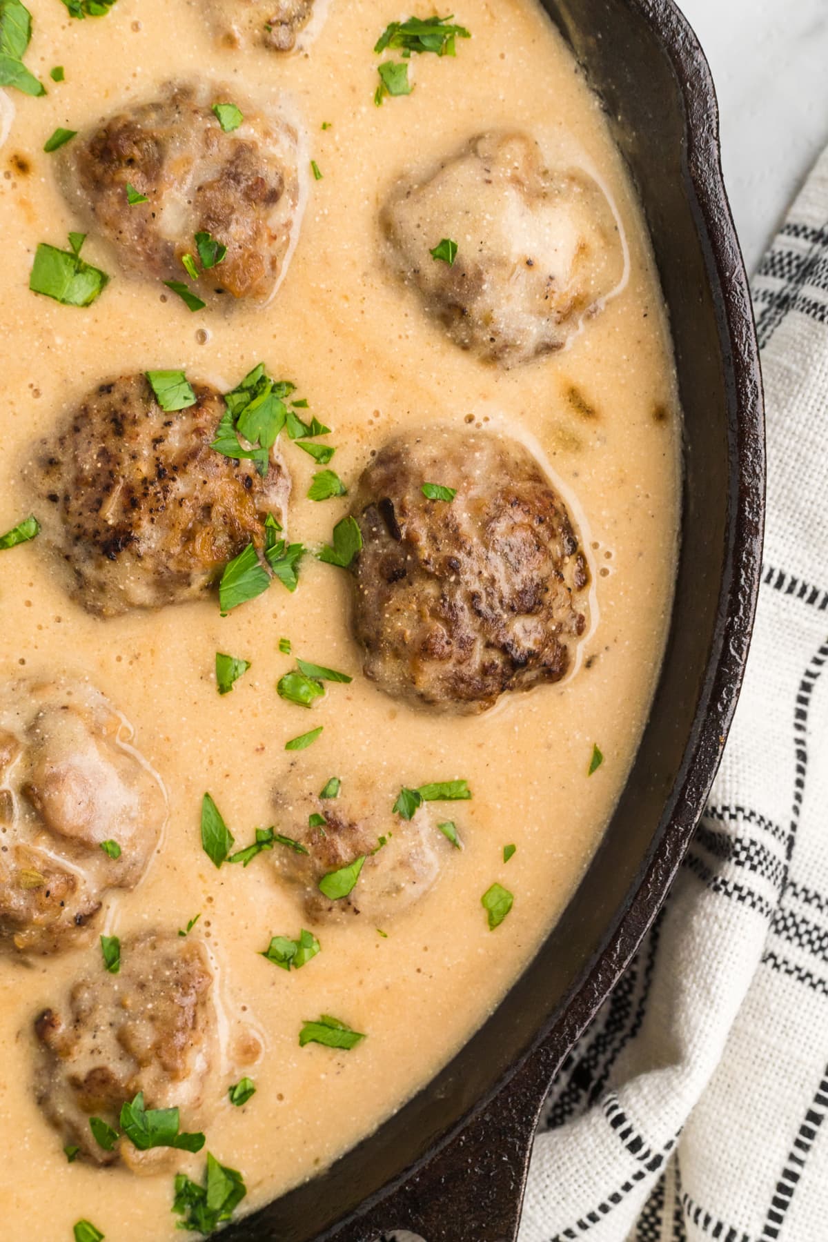 Close up of Swedish meatballs in a skillet