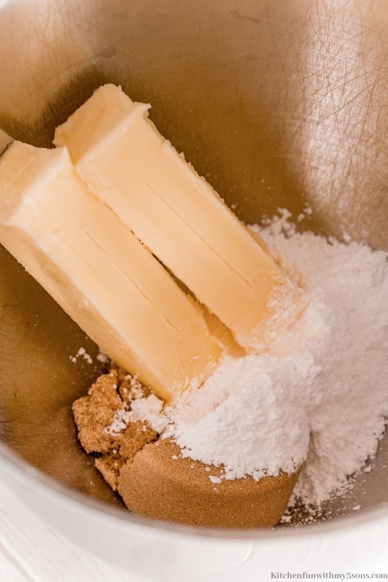 The butter and sugars in an electric mixer.