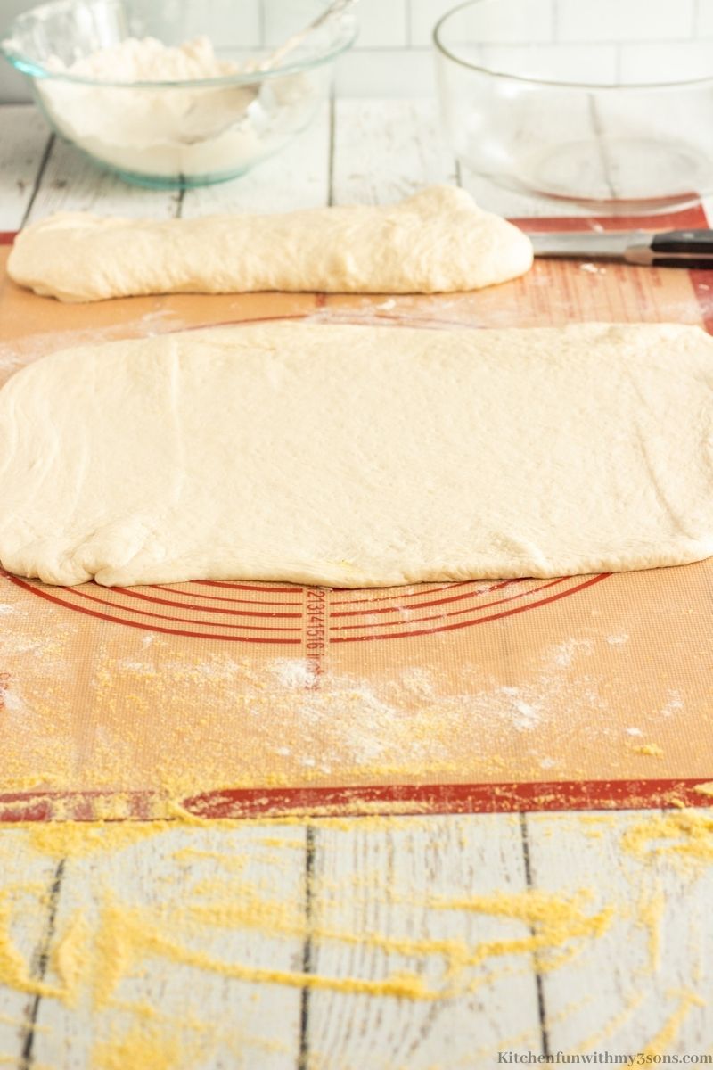 One of the dough portions shaped into a rectangle.