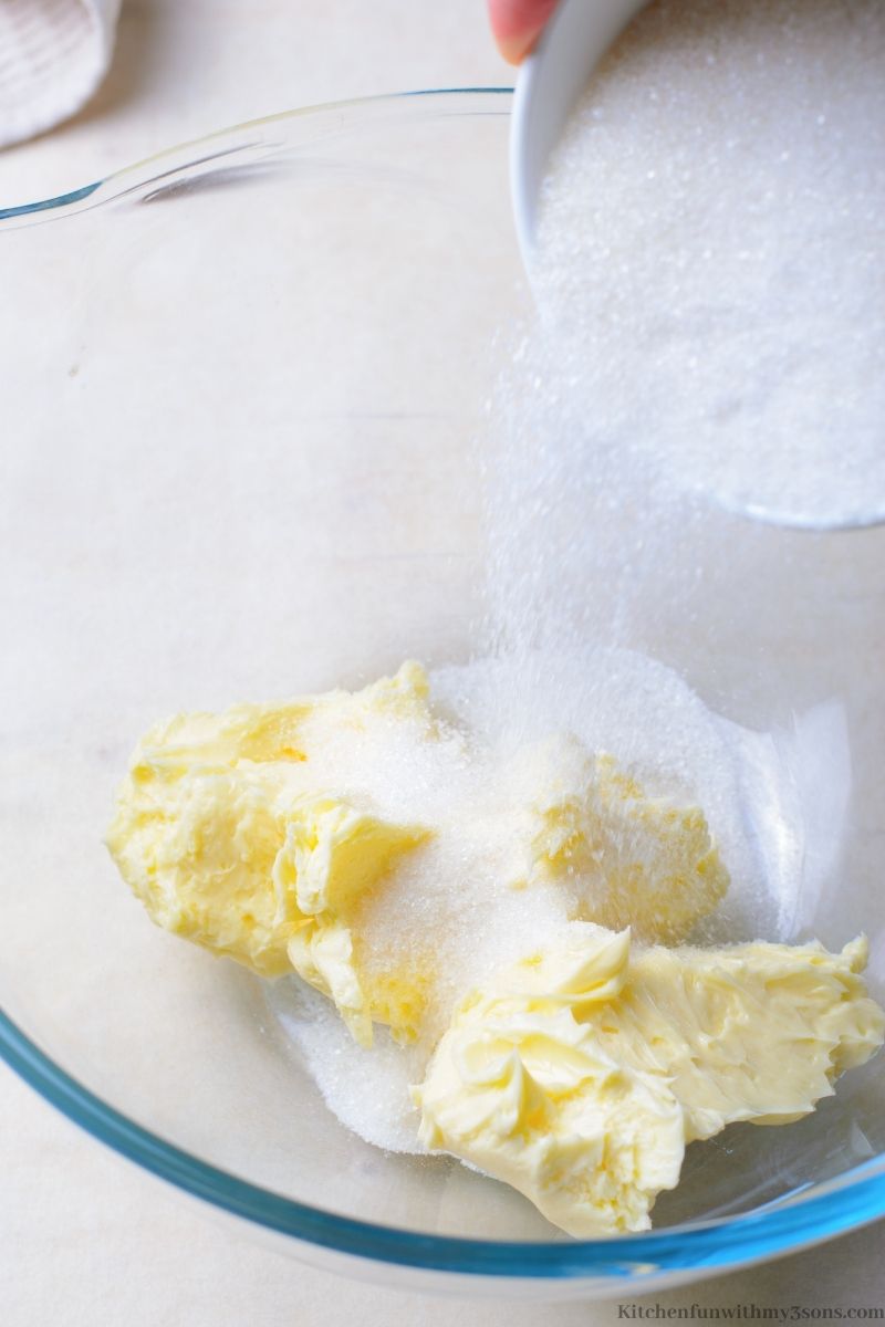 Combing the butter and sugar in a bowl.