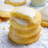 Vanilla Meltaway Cookies stacked on parchment paper
