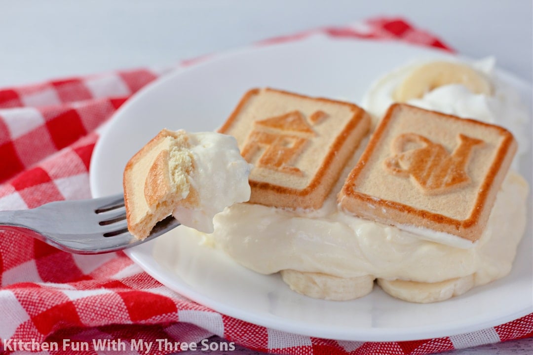 Banana pudding with Chessmen cookies on a plate