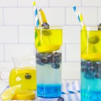 Blueberry Vodka Lemonade has  a sweet vanilla blueberry base and a tart, yet bubbly lemonade layer. It's a delicious cocktail recipe.