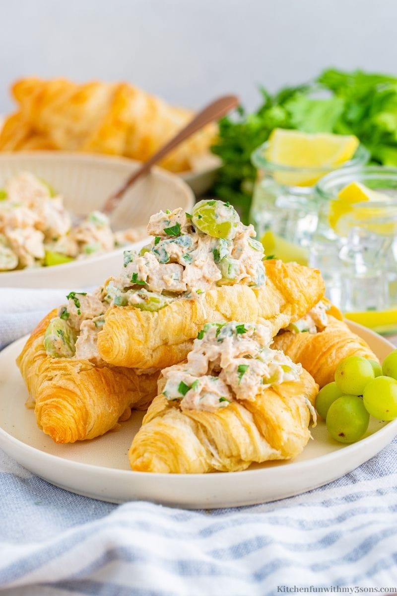 Croissants with homemade chicken salad on a plate