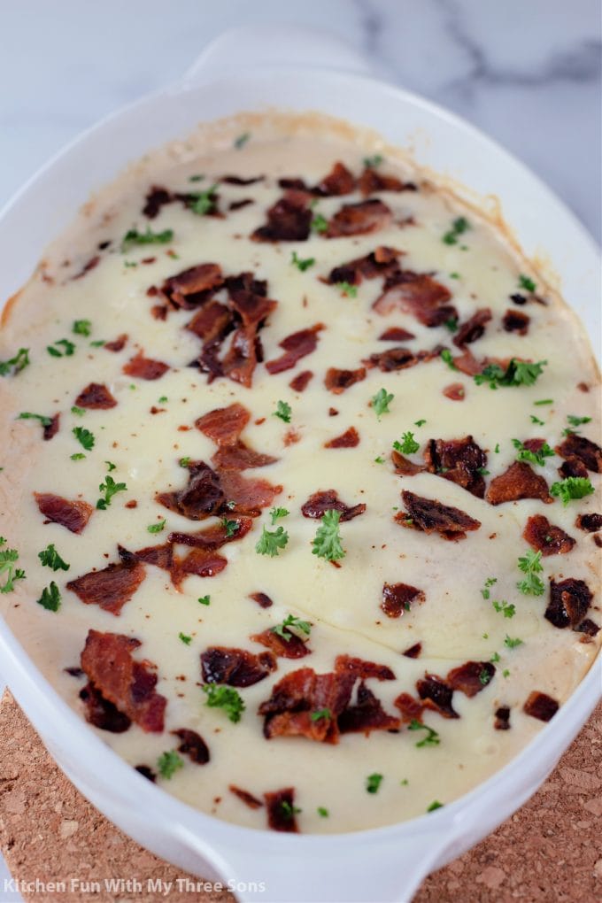 freshly baked Cheesy Smothered Chicken with Bacon.