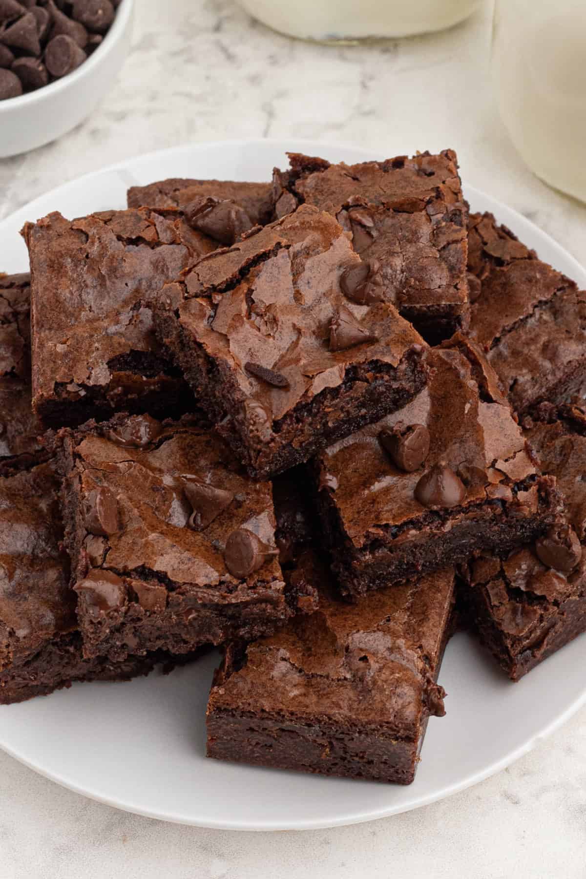 top view of stacked brownies on a plate