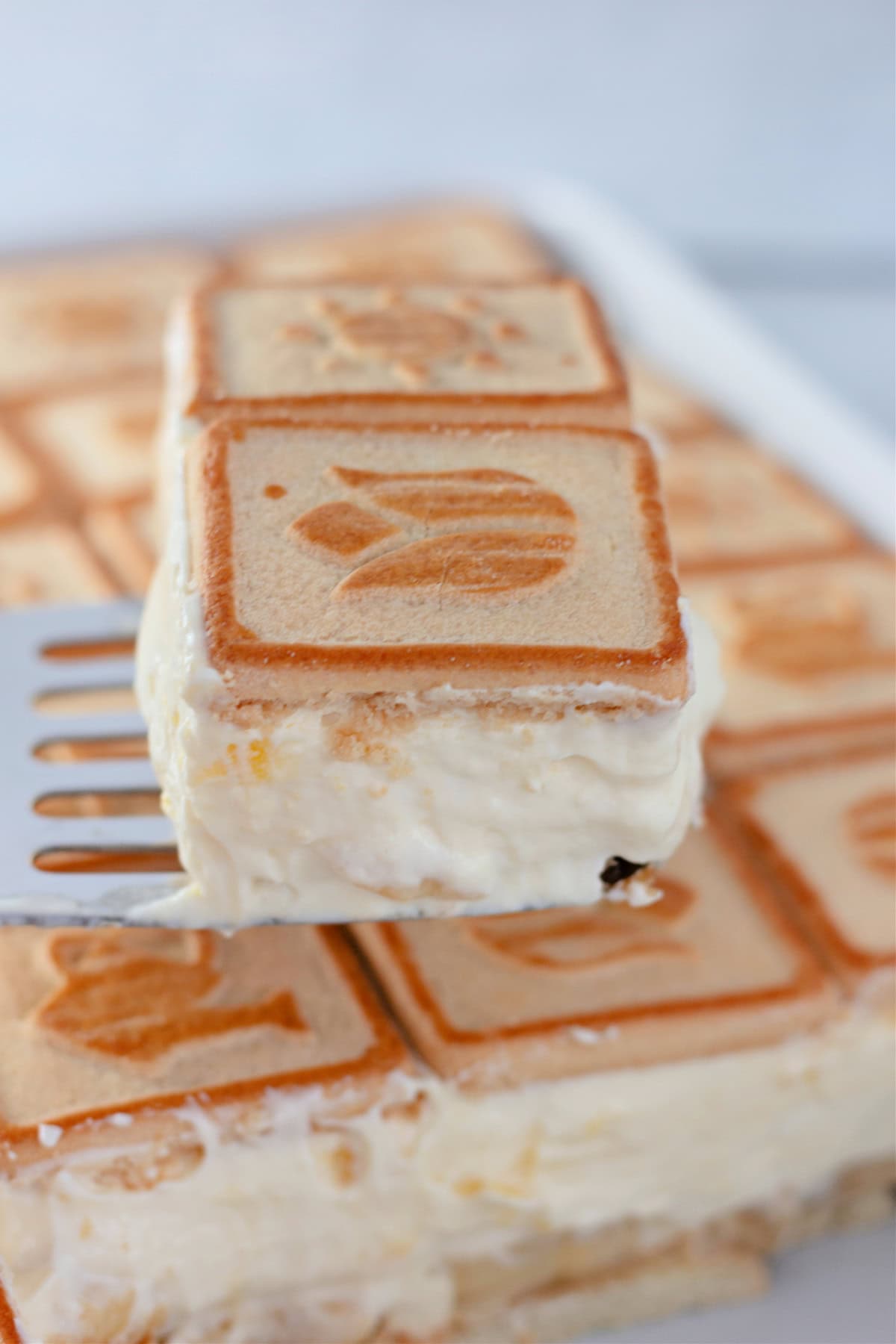 Not Yo Mama's Banana Pudding being lifted with a spatula