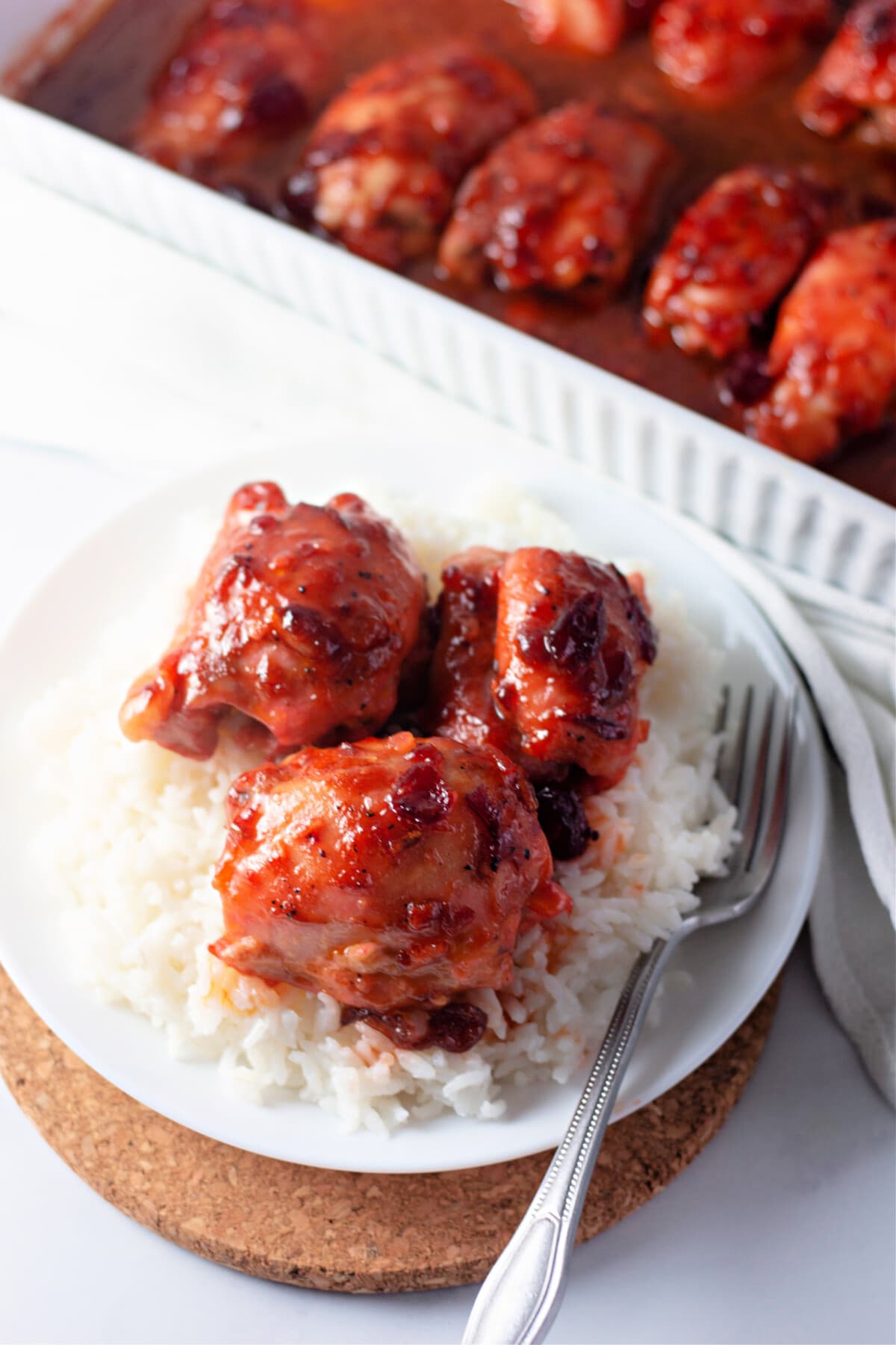 Cranberry Chicken with rice on a plate